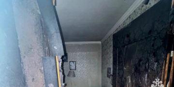 В Армавире женщина с младенцем на руках взывала о спасении из горящей пятиэтажки